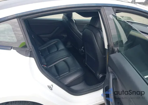 2021 Tesla Model 3 Standard Range Plus Rear-Wheel Drive from USA, damaged, VIN 5YJ3E1EAXMF838243